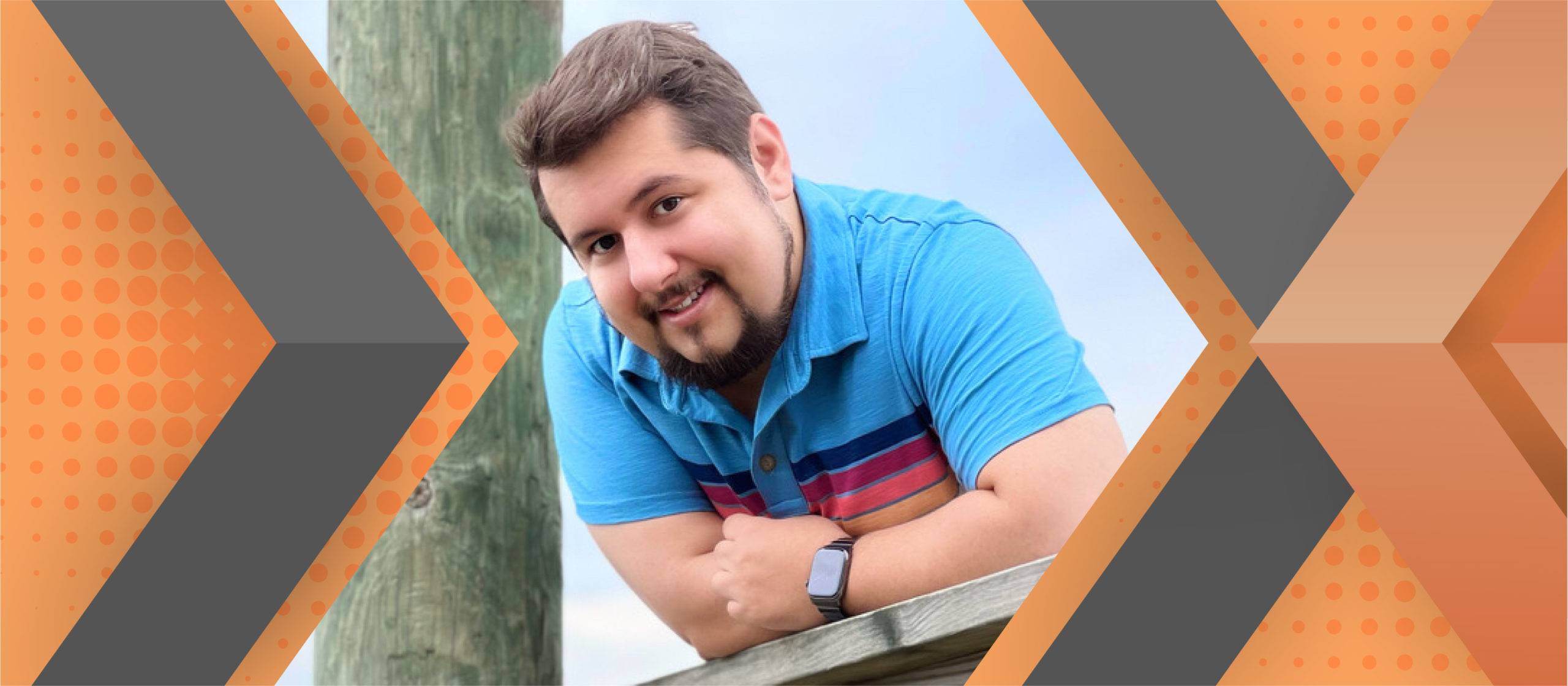 Portrait of Robert Pereira framed by an orange and gray geometric background.