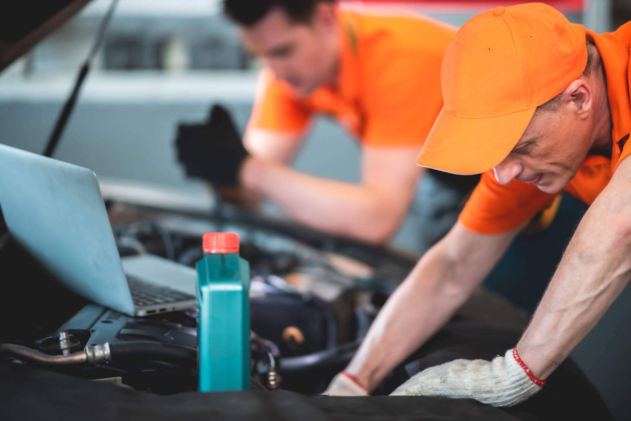 Mechanic car service worker man technician are maintenance or repair vehicle car engine in garage shop , workshop work with auto inspection automobile station, job of repairman