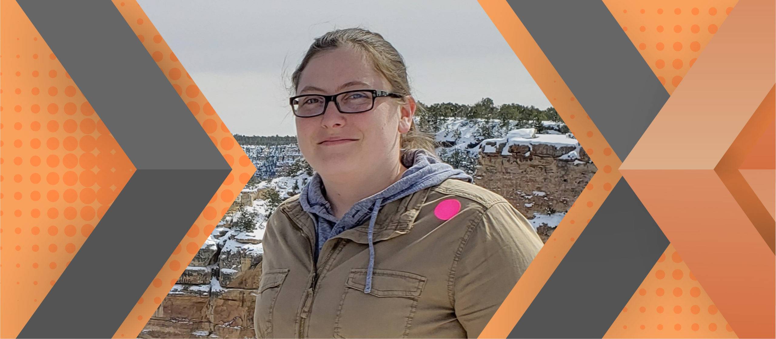 Portrait of Alyssa Redmond framed by an orange and gray geometric background.